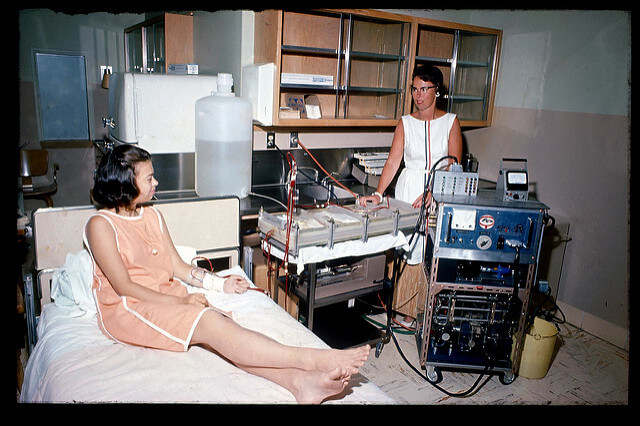 Susan Vukich, right, learned how to give Caroline Helm, the first home dialysis patient, dialysis treatments at home in Seattle. 